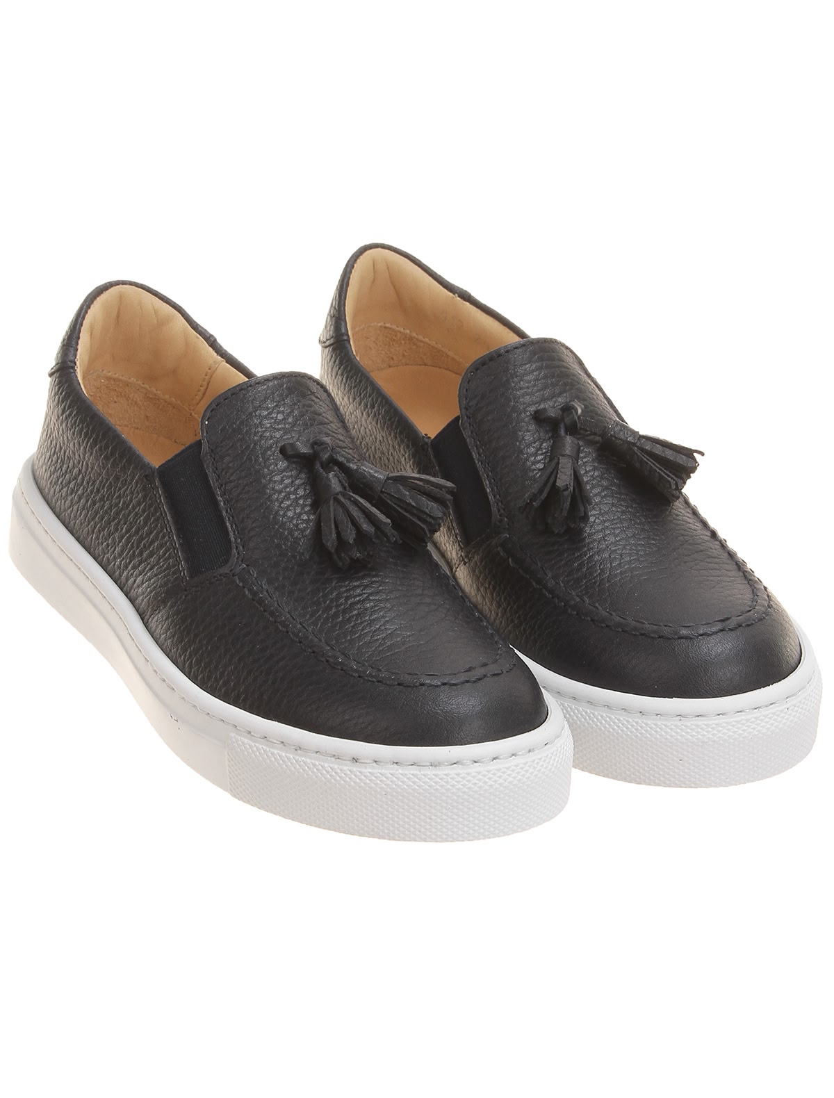 Кожаные слипоны с кисточками