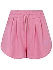 Короткие розовые шорты - 1414509372107