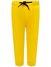 Желтые брюки джоггеры - 1084519270399