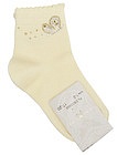 Желтые носки с декором - 1534509370160